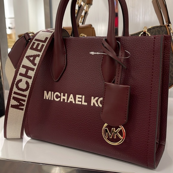Michael Kors Mirella Small Pebbled Leather Crossbody Bag
Oxblood 
NWT - Picture 10 of 16